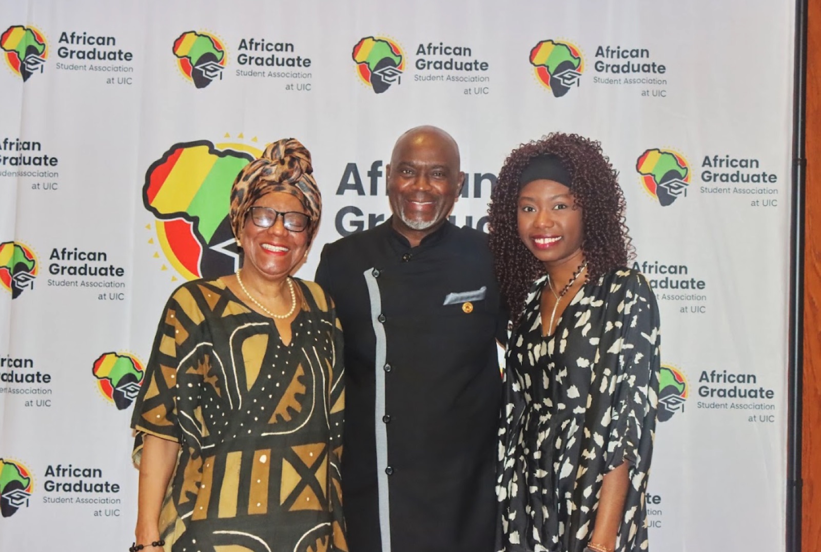Faculty advisor Dr. Ezinne Achinivu-Ibagere with guests at the Africa Day Gala 2026